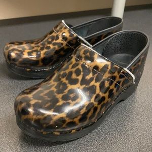 Dansko animal print mules slip on